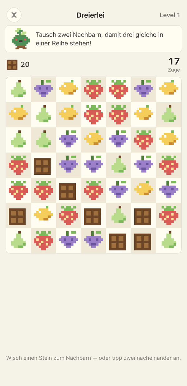 Dreierlei, das Spiel mit drei gleichen: ein Brett aus Pixel-Früchten und Schokolade.